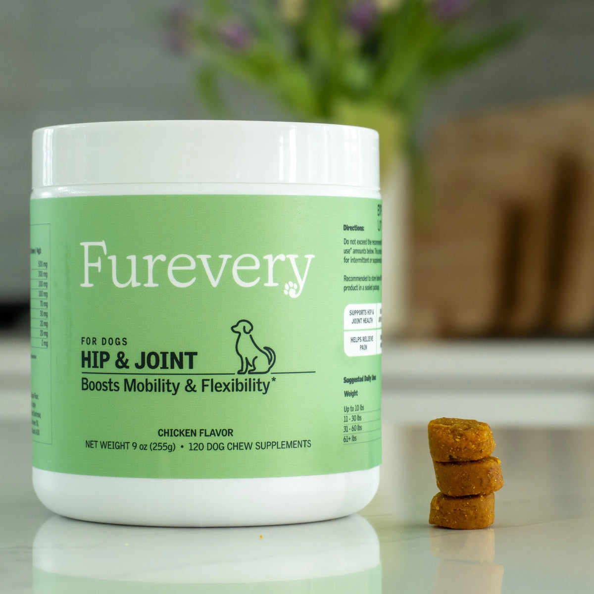 Furevery Hip & Joint chicken-flavor chews jar on a kitchen counter with three soft chews